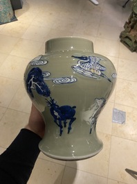 Un vase en porcelaine de Chine en bleu, blanc et rouge de cuivre &agrave; fond c&eacute;ladon, Kangxi